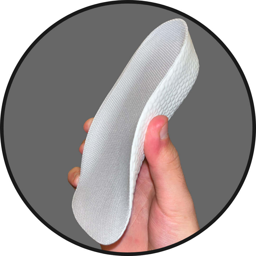 Inchmaxxers 2.0 - Height Increasing Insoles in hand on grey background